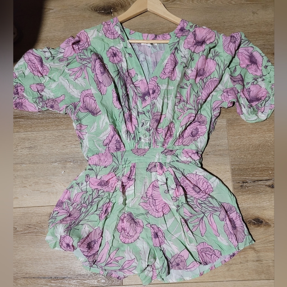 Floral romper light mint green with light purplish flowers